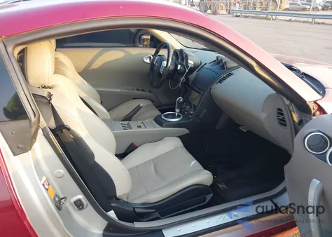 2004 Nissan 350Z Touring z USA, uszkodzony, nr VIN JN1AZ34E94T060058